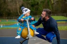 A person and a baby on a scooter
AI-generated content may be incorrect.